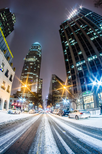 charlotte city street and skyline during winter storm by DigiDreamGrafix.com