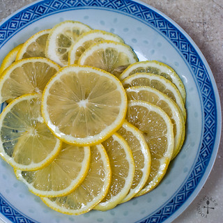 slice a lemon as thinly as possible