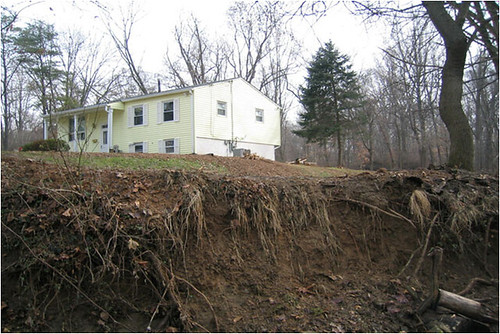 A property suffering damage due to erosion. 