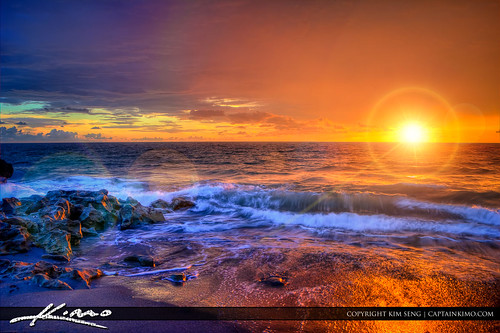 Sunrise from blowing rocks along the beach on Jupiter Island by Captain Kimo