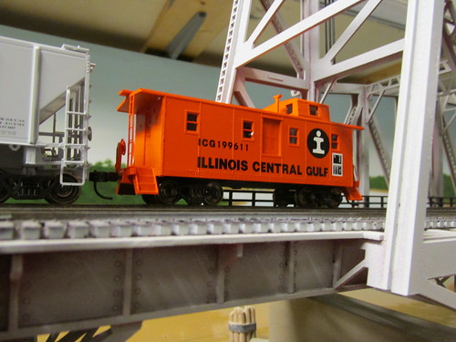 A Centralia Car Shops H.O Scale model of a 1970's era Illinois Central Gulf Railroad orange side door caboose. by Eddie from Chicago