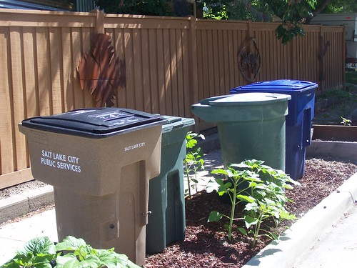Salt Lake City's different types of trash (green), recycling (blue), and yard waste (brown) trash cans