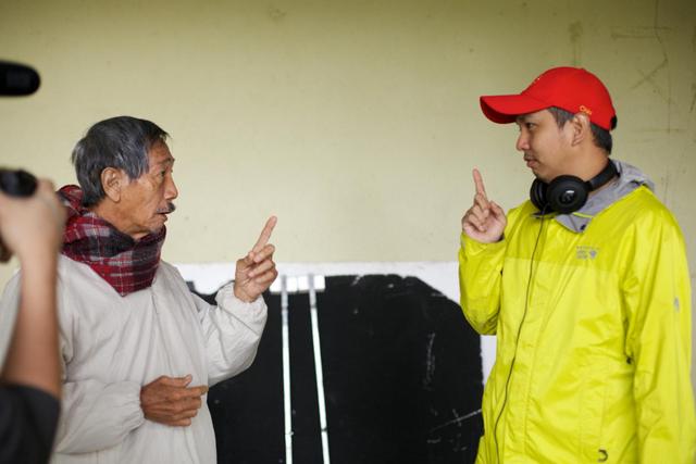Director Chiu interacting with Frankie Lee on the set of The Journey