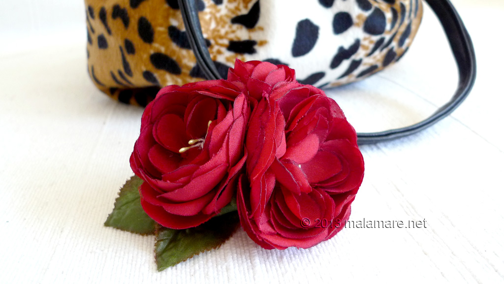 velvet handbag with leopard pattern roses