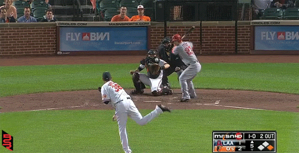 Manny Machado makes a diving stop on a Mike Trout grounder