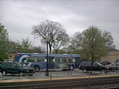 A Pace bus heading eastbound on Hillgrove Avenue during a springtime rain shower.  La Grange Illinois.  April 2007. by Eddie from Chicago