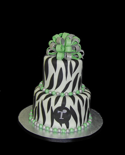 2 tier zebra print 50th birthday cake with green and silver accents