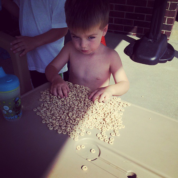 Sending him outside with the while bag of Cheerios probably wasn't the best idea....