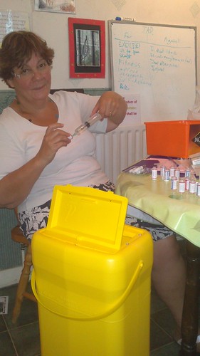 Jane loads another syringe