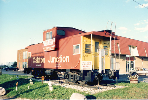 The Oakton Junction commercial real estate caboose on Oakton Street.  Des Plaines Illinois.  October 1988. by Eddie from Chicago
