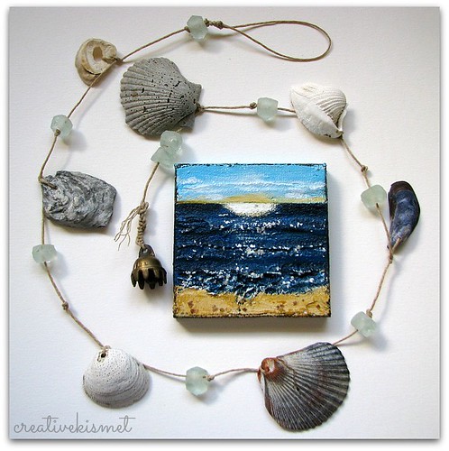 mini ocean art and string of shells