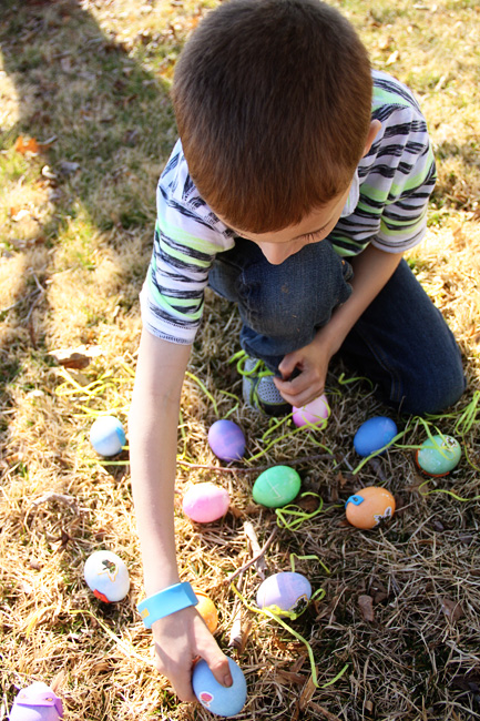 Egg-Hunt_Nathan-looking-at-his-eggs-on-ground