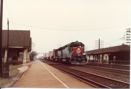 Eastbound Southern Pacific freight train passing the Stone Avenue station.  La Grange Illinois.  February 1986. by Eddie from Chicago