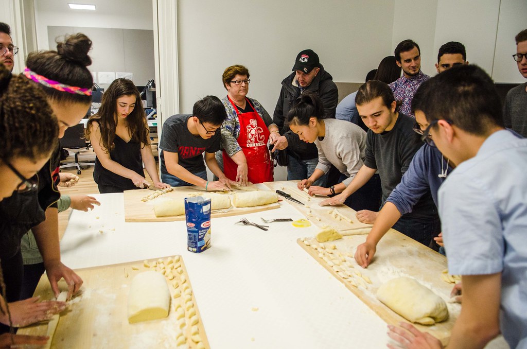 Flati teaches students how to make gnocchi from scratch in the kitchen at the palazzo.