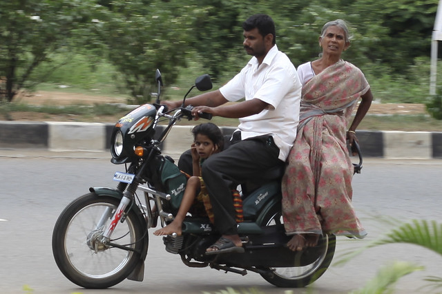 Joint family on a moped