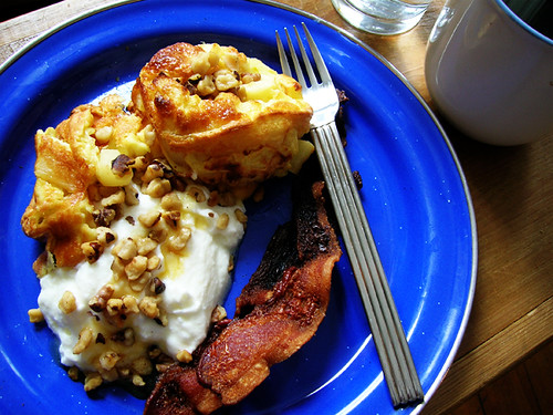 sweet apple clafouti with greek yogurt, toasted walnuts, maple syrup and bacon, with water and coffee