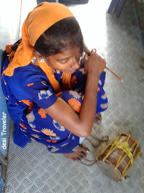 banjara girl with small drum dhol