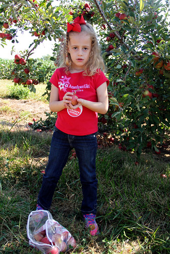 Apple_Serious-holding-apple