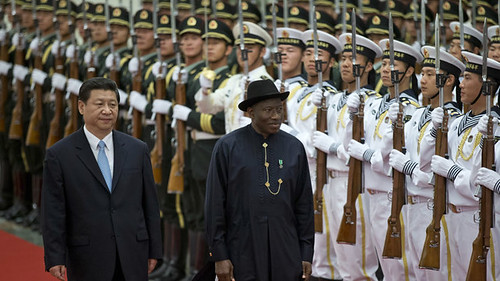 People's Republic of China President Xi Jinping walks with Federal Republic of Nigeria President Goodluck Jonathan in Beijing on July 10, 2013. by Pan-African News Wire File Photos