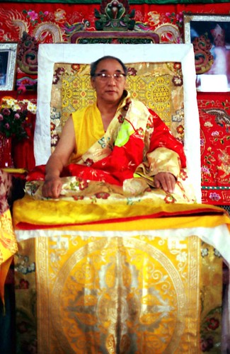 His Holiness Jigdal Dagchen Sakya on the religious throne leading Sakya Lamdre, formal silk robes, double dorje, Tibetan Buddhism, Tharlam Monastery, Boudha, Kathmandu, Nepal, 1990 by Wonderlane