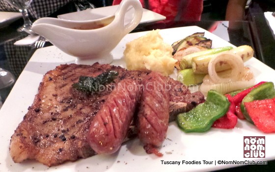 Dow Jones - US T-bone with prawns, potato wedges, sausages, and roasted vegetables