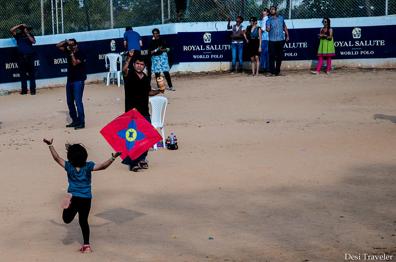 girl running with kite