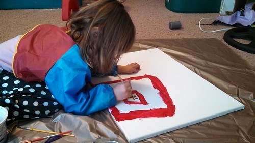 Lily painting the zoo