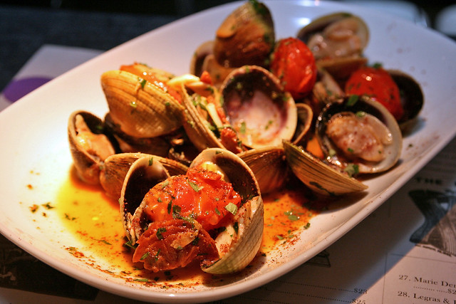 Littleneck clams from New Zealand, sauteed in butter, garlic, chorizo and white wine