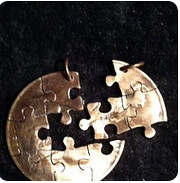 puzzle cut out coin