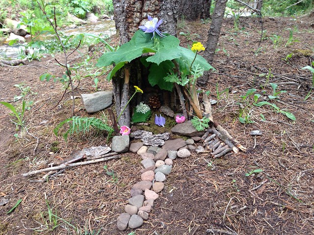 An outdoor fairy house built by Rachel and Mom
