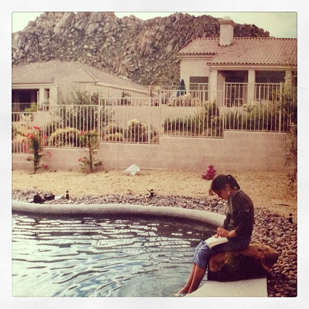 I used to be a bookworm, now I'm just a phoneworm. Still have bad posture though... #tbt #throwbackthursday #reading #arizona #poolside #noseinabook