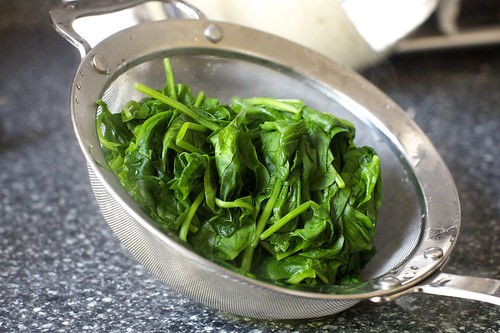 wilted spinach, to drain and squeeze