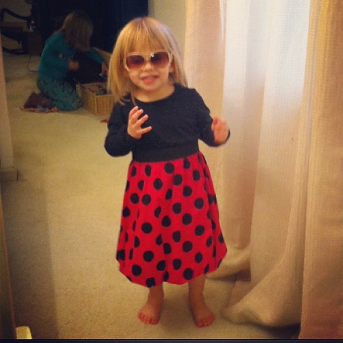 Little Miss Movie Star. She's preening, "You like my dress? You like my sunglasses?" Yes, baby, you're gorgeous.