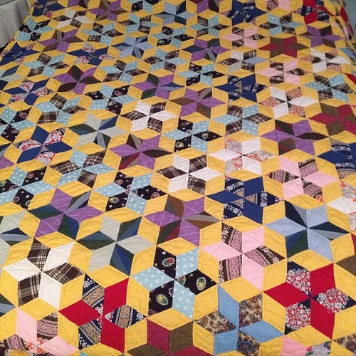 Blowing my mind. My mother-in-law just put this quilt on our bed. Never seen it before ( in 9.5 yrs of marriage), even though I've heard stories of the quilt they both helped a going-blind church lady finish. Totally hand pieced and hand quilted.  I start