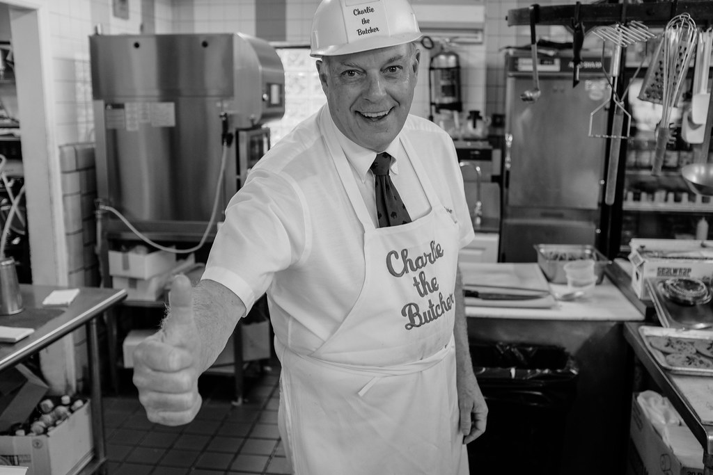 Charles W. Roesch, better known as Charlie the Butcher, at his restaurant in Williamsville, N.Y., shot at 1/50, f2.8 at ISO 800.