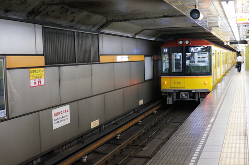 old-style colored Ginza line subway train
