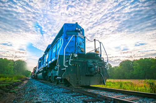 blue freight train engine at sunrise by DigiDreamGrafix.com