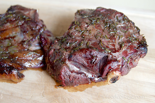 Venison marinating in herb rub and blueberry marinade