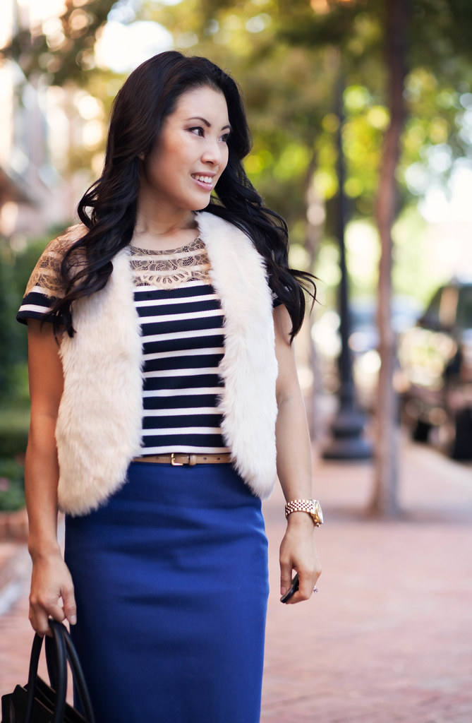 cute & little blog | white fur vest, nautical striped lace top, j. crew blue pencil skirt, sole society tierra black gold cap toe, celine mini luggage tote outfit #ootd