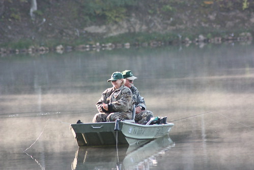Enjoy fishing in the early morning at Douthat State Park by staying in a cabin or campground.