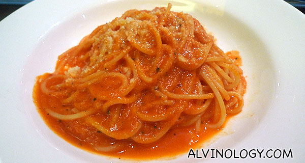 Kid's bolognese spaghetti which comes with an orange juice - S$12