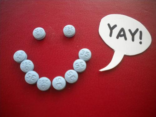 Birth control pills making a smiley face