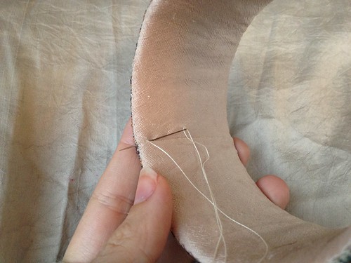 Sewing down the lining
