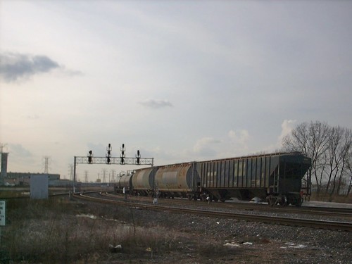 Westbound BNSF Railway unit grain train passing through Hayford Junction near sunset.  Chicago Illinois.  March 2007. by Eddie from Chicago