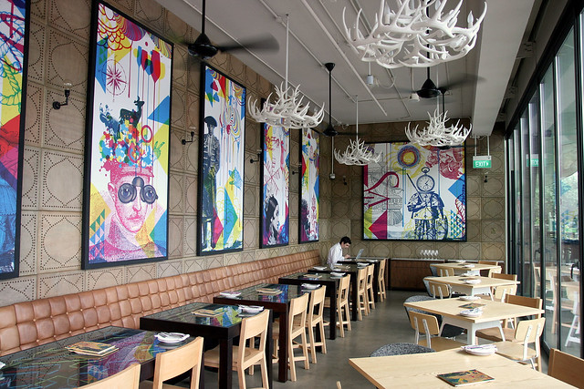 CMYK Dada inspired artwork juxtapose with handpainted Catalan tiles in the contemporary decor