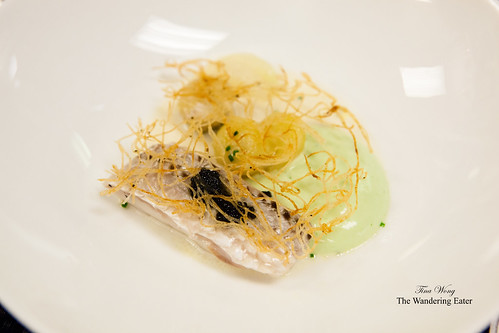 Poached striped bass with celery and potato rosti