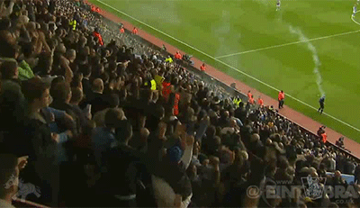 10383228434 f60179d440 o GIF: A Spurs fan throws a smoke bomb at Villa Park which hits the linesman