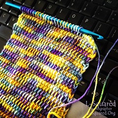Another in progress shot - showing lots of loops of the current scarf row on the hook.