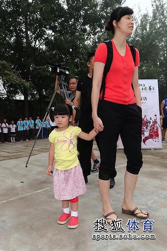 June 30th, 2013 - Yao Ming's wife Ye Li and baby daughter Amy visits a primary school with Yao Ming and Joakim Noah