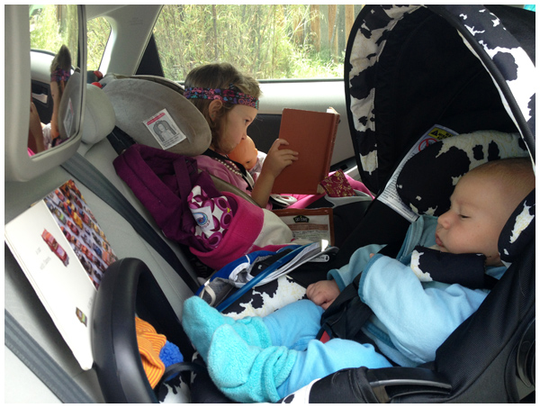 Kids reading in the car